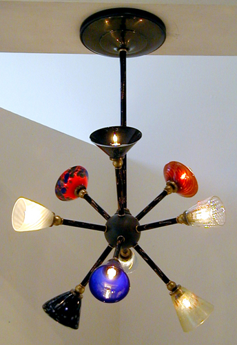 Starburst is a chandelier of hand blown glass